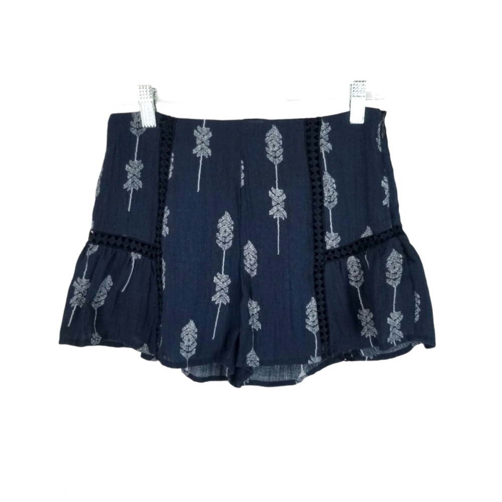 Moon River Eyelet Ruffled Arrow Print Shorts